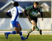 14 January 2006; Chris Keane, Connacht, kicks ahead of Murphy Taele, Montpellier. European Challenge Cup, Pool 5, Connacht v Montpellier, Sportsground, Galway. Picture credit: Damien Eagers / SPORTSFILE