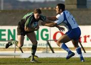 14 January 2006; Matt Mostyn, Connacht, is tackled by Alex Stoica, Montpellier. European Challenge Cup, Pool 5, Connacht v Montpellier, Sportsground, Galway. Picture credit: Damien Eagers / SPORTSFILE