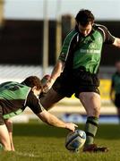14 January 2006; David Slemen, Connacht, kicks a conversation as Matt Mostyn holds the ball. European Challenge Cup, Pool 5, Connacht v Montpellier, Sportsground, Galway. Picture credit: Damien Eagers / SPORTSFILE