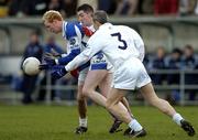 15 January 2006; Padraig Clancy, Laois, in action against Martin McIntyre, 3, and Andrew McLoughlin, Kildare. O'Byrne Cup, Second Round, Kildare v Laois, St. Conleth's Park, Newbridge, Co. Kildare. Picture credit: Pat Murphy / SPORTSFILE