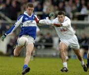 15 January 2006; Gary Kavanagh, Laois, in action against Andrew McLoughlin, Kildare. O'Byrne Cup, Second Round, Kildare v Laois, St. Conleth's Park, Newbridge, Co. Kildare. Picture credit: Pat Murphy / SPORTSFILE
