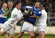 15 January 2006; Colm Parkinson, Laois, in action against James Lonergan, left, and Padraig O'Neill, Kildare. O'Byrne Cup, Second Round, Kildare v Laois, St. Conleth's Park, Newbridge, Co. Kildare. Picture credit: Pat Murphy / SPORTSFILE