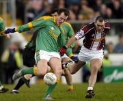 15 January 2006; Joe Sheridan, Meath, in action against Michael Ennis, Westmeath. O'Byrne Cup, Second Round, Meath v Westmeath, Pairc Tailteann, Navan, Co. Meath. Picture credit: Damien Eagers / SPORTSFILE