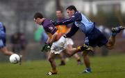 15 January 2006; Colm Morris, Wexford, in action against Alan Brogan, Dublin. O'Byrne Cup, Second Round, Dublin v Wexford, O'Toole's GAA Club, Ayrefield Park, Coolock, Dublin. Picture credit: Brian Lawless / SPORTSFILE