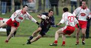 15 January 2006; Joe McMahon, St. Mary's College Belfast, in action against Colm Donnelly and Ryan Mellon, Tyrone. Dr McKenna Cup, Tyrone v St. Mary's College Belfast. Coalisland, Co. Tyrone. Picture credit: Oliver McVeigh / SPORTSFILE