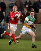 15 January 2006; Ronan Green, Louth, in action against Gary Mahon, Offaly. O'Byrne Cup, Second Round, Louth v Offaly, Clanna Gael Park, Dundalk, Co. Louth. Picture credit: Ray McManus / SPORTSFILE