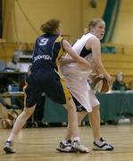 15 January 2006; Diane Griffin, Mustang Sallys St. Paul's, Killarney, in action against Jillian Ahern, UL Aughinish, Limerick. Ladies National Cup Basketball Semi-Final, Mustang Sallys St. Paul's, Killarney v UL Aughinish, Limerick, National Basketball Arena, Tallaght, Dublin. Picture credit: Brendan Moran / SPORTSFILE