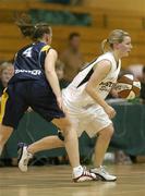15 January 2006; Mairead Finnegan, Mustang Sallys St. Paul's, Killarney, in action against Michelle Aspell, UL Aughinish, Limerick. Ladies National Cup Basketball Semi-Final, Mustang Sallys St. Paul's, Killarney v UL Aughinish, Limerick, National Basketball Arena, Tallaght, Dublin. Picture credit: Brendan Moran / SPORTSFILE