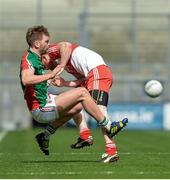 13 April 2014; Fergal Doherty, Derry, fouls Aidan O'Shea, Mayo, which resulted in Doherty being sent off for a second yellow card offence. Allianz Football League Division 1 Semi-Final, Derry v Mayo, Croke Park, Dublin. Picture credit: Piaras Ó Mídheach / SPORTSFILE