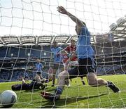 13 April 2014; Nicky Devereux, Dublin, is unable to keep out Cork's second goal. Allianz Football League Division 1 Semi-Final, Cork v Dublin, Croke Park, Dublin. Picture credit: David Maher / SPORTSFILE