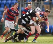 13 April 2014; Rowan Considine, Clontarf, is tackled by Max Ludwig and Michael Oyuga, bottom, Old Belvedere. 98FM Metro Cup Final, Old Belvedere v Clontarf, Donnybrook Stadium, Donnybrook, Dublin. Picture credit: Pat Murphy / SPORTSFILE