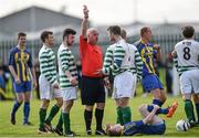 13 April 2014; Referee Tom Tully sends off Paul Murphy, Sheriff YC, during the game against St. Michaels FC. FAI Junior Cup Semi-Final, sponsored by Aviva and Umbro, St. Michaels FC v Sheriff YC, Clonmel, Co. Tipperary. Picture credit: Matt Browne / SPORTSFILE