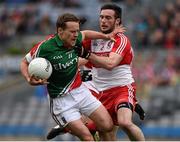 13 April 2014; Andy Moran, Mayo, in action against Oisin Duffy, Derry. Allianz Football League Division 1 Semi-Final, Derry v Mayo, Croke Park, Dublin. Picture credit: Ray McManus / SPORTSFILE