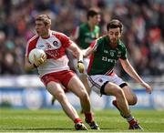 13 April 2014; Ciaran McFaul, Derry, in action against Kevin McLoughlin, Mayo. Allianz Football League Division 1 Semi-Final, Derry v Mayo, Croke Park, Dublin. Picture credit: David Maher / SPORTSFILE