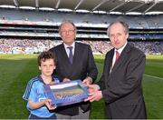 13 April 2014; Donal Bollard, from Allianz, and Brendan Murphy, Cumann na mBunscoil Chairman, make a special presentation to Cathal O'Grady, St Brigid's, Killester, in Croke Park to mark his outstanding performance during the Allianz Cumann na mBunscol competitions. Picture credit: Ray McManus / SPORTSFILE