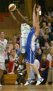 15 January 2006; Patrick Pope, Merry Monk, Ballina, in action against Tim O'Halloran, UCC Demons. Mens National Cup Basketball Semi-Final, UCC Demons v Merry Monk, Ballina, National Basketball Arena, Tallaght, Dublin. Picture credit: Brendan Moran / SPORTSFILE