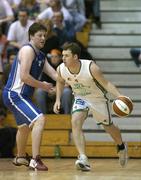 15 January 2006; Paul Barrett, Merry Monk, Ballina, in action against Niall O'Reilly, UCC Demons. Mens National Cup Basketball Semi-Final, UCC Demons v Merry Monk, Ballina, National Basketball Arena, Tallaght, Dublin. Picture credit: Brendan Moran / SPORTSFILE
