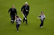 16 January 2006; Sean Kelly, President, GAA, and Vincent Sheridan, Chief Executive, Vhi Healthcare, with Aoife Wade, 8, Whitehall Colmcilles, and Aisling Bergin, 9, Na Fianna, at the announcement of a new summer camp initiative, Vhi Cul Camps, which will see an estimated 80,000 children receive hurling, Camogie and Gaelic Football coaching at GAA run camps every summer. Croke Park, Dublin. Picture credit; Pat Murphy / SPORTSFILE