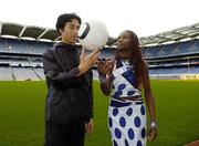 19 January 2006; Football freestyler Nam Nguyen with Cate Gatharia from Kenya at the announcement by SARI (Sport against Racism Ireland) of the Brian Kerr Inter-Continental League opening match between China and Poland. Croke Park, Dublin. Picture credit: Damien Eagers / SPORTSFILE