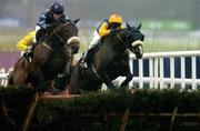 29 December 2005; Maxxium, with Johnny Murtagh up, left, clears the last ahead of Rocket ship, Paul Carberry up, on their way to winning the Bewleys Hotel Leeds Hurdle. Leopardstown Racecourse, Co. Dublin. Picture credit: Brian Lawless / SPORTSFILE