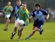 22 January 2006; Daithi Regan, Meath, in action against Donncha Reilly, left, and Mark Fitzpatrick, Dublin. O'Byrne Cup, Semi-Final, Dublin v Meath, Parnell Park, Dublin. Picture credit: Brian Lawless / SPORTSFILE
