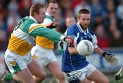 22 January 2006; Colm Parkinson, Laois, in action against Neville Coughlan, Offaly. O'Byrne Cup, Semi-Final, Laois v Offaly, O'Moore Park, Portlaoise, Co. Laois. Picture credit: David Maher / SPORTSFILE