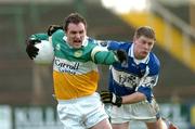 22 January 2006; Scott Brady, Offaly, in action against Brian McDonald, Laois. O'Byrne Cup, Semi-Final, Laois v Offaly, O'Moore Park, Portlaoise, Co. Laois. Picture credit: David Maher / SPORTSFILE