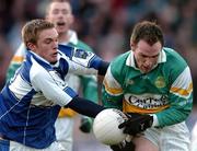 22 January 2006; Scott Brady, Offaly, in action against Ross Munnelly, Laois. O'Byrne Cup, Semi-Final, Laois v Offaly, O'Moore Park, Portlaoise, Co. Laois. Picture credit: David Maher / SPORTSFILE