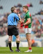 13 April 2014; Referee Pádraig Hughes in coversation with Lee Keegan, Mayo. Allianz Football League Division 1 Semi-Final, Derry v Mayo, Croke Park, Dublin. Picture credit: Piaras Ó Mídheach / SPORTSFILE