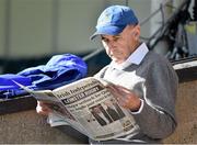18 April 2014; A Leinster supporter reads the Irish Independent ahead of the days game. Celtic League 2013/14 Round 20, Leinster v Benetton Treviso, RDS, Ballsbridge, Dublin. Picture credit: Paul Mohan / SPORTSFILE