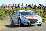18 April 2014; Craig Breen and Scott Martin, in a Peugeot 208 T16 R5, in action during the SS6 - Bucks Head, Round 2 of the Circuit of Ireland International Rally, Co. Down. Picture credit: Philip Fitzpatrick / SPORTSFILE