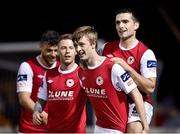 18 April 2014; Chris Forrester, second from right, St Patrick's Athletic, celebrates after scoring his side's  third goal with team-mate's  Christy Fagan, right and Lee Lynch. Airtricity League Premier Division, St Patrick's Athletic v Bohemians, Richmond Park, Dublin. Picture credit: David Maher / SPORTSFILE