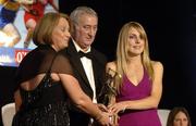 12 November 2005; Rachel Moloney, from Cork, who was presented with her award by Ossie Kilkenny, Chairperson, of the Irish Sports Council and Miriam O'Callaghan, left, President, Cumann Camogaiochta na nGael, at the 2005 Camogie All-Star Awards, in association with O'Neill. Citywest Hotel, Dublin. Picture credit: Ray McManus / SPORTSFILE
