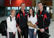 18 January 2006; Limerick hurling brothers Ollie Moran with his wife Lisa Quinlan, left,  and Niall Moran, with his girlfriend Teresa Kennedy prior to their departure to Singapore for the 2006 Vodafone All-Stars Hurling Tour. Shannon Airport, Shannon, Co. Clare. Picture credit; Kieran Clancy / SPORTSFILE