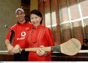 19 January 2006; Amy Teo, Guest Services Manager, Marina Mandarin Hotel, with Dan Shanahan, Waterford, as the 2006 Vodafone All-Stars Hurling Tour teams arrive. Marina Mandarina Hotel, Marina Square, Singapore. Picture credit; Ray McManus / SPORTSFILE