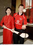 19 January 2006; Amy Teo, Guest Services Manager, Marina Mandarin Hotel, with Niall Gilligan, Clare, as the 2006 Vodafone All-Stars Hurling Tour teams arrive. Marina Mandarina Hotel, Marina Square, Singapore. Picture credit; Ray McManus / SPORTSFILE