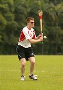 20 January 2006; Niall Gilligan, Clare, during training in advance of the 2006 Vodafone All-Stars Hurling game. Singapore Polo Club, Singapore. Picture credit; Ray McManus / SPORTSFILE