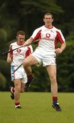 20 January 2006; Ollie Moran and Dave Prendergast, left, during training in advance of the 2006 Vodafone All-Stars Hurling game. Singapore Polo Club, Singapore. Picture credit; Ray McManus / SPORTSFILE