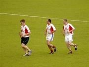 20 January 2006; Niall Gilligan, Clare, and Wexford players Adrian Fenlon and Damien Fitzhenry during training in advance of the 2006 Vodafone All-Stars Hurling game. Singapore Polo Club, Singapore. Picture credit; Ray McManus / SPORTSFILE