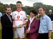 21 January 2006; Philip Maher, Tipperary, who played on the 2005 Vodafone All-Stars team, is presented with a commerative medal by GAA President Sean Kelly in the company of Helen Marks, Head of Brand and Marcomms, Vodafone Ireland and Minister for Transport Martin Cullen, T.D., after the game. Exhibition Game, 2004 Vodafone All-Stars v 2005 Vodafone All-Stars, Singapore Polo Club, Singapore. Picture credit; Ray McManus / SPORTSFILE