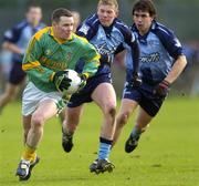 22 January 2006; Daithi Regan, Meath, in action against Donncha Reilly and Mark Fitzpatrick, right, Dublin. O'Byrne Cup, Semi-Final, Dublin v Meath, Parnell Park, Dublin. Picture credit: Brian Lawless / SPORTSFILE