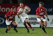 27 January 2006; Andy Maxwell, Ulster, is tackled by Matthew Rees, Llanelli Scarlets. Celtic League 2005-2006, Group A, Ulster v Llanelli Scarlets, Ravenhill, Belfast. Picture credit: Oliver McVeigh / SPORTSFILE