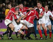 27 January 2006; Matt McCullagh, Ulster, is tackled by Dafydd James, Llanelli Scarlets. Celtic League 2005-2006, Group A, Ulster v Llanelli Scarlets, Ravenhill, Belfast. Picture credit: Oliver McVeigh / SPORTSFILE