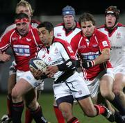 27 January 2006; Kieran Campbell, Ulster, is tackled by Tal Selley, Llanelli Scarlets. Celtic League 2005-2006, Group A, Ulster v Llanelli Scarlets, Ravenhill, Belfast. Picture credit: Oliver McVeigh / SPORTSFILE