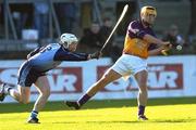 29 January 2006; Eoin Quigley, Wexford, in action against David Sweeney, Dublin. Walsh Cup, Dublin v Wexford, Parnell Park, Dublin. Picture credit: Brian Lawless / SPORTSFILE