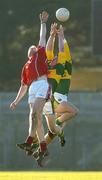 29 January 2006; Darragh O'Se and Paddy Kelly, Kerry, contest a high ball with Nicolas Murphy, Cork. McGrath Cup Final, Cork v Kerry, Pairc Ui Rinn, Cork. Picture credit: Matt Browne / SPORTSFILE