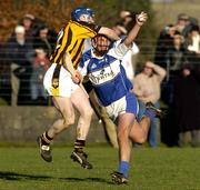 29 January 2006; Eoin Bergin, Laois, in action against Willie O'Dwyer, Kilkenny. Walsh Cup, Laois v Kilkenny, Kelly Daly Park, Rathdowney, Co. Laois. Picture credit: Damien Eagers / SPORTSFILE