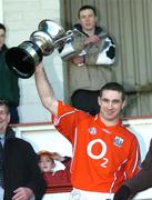 29 January 2006; Cork captain Eoin Sexton lifts the McGrath Cup. McGrath Cup Final, Cork v Kerry, Pairc Ui Rinn, Cork. Picture credit: Matt Browne / SPORTSFILE