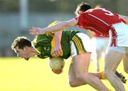 29 January 2006; Adrian O'Connor, Kerry, is tackled by Graham Canty, Cork. McGrath Cup Final, Cork v Kerry, Pairc Ui Rinn, Cork. Picture credit: Matt Browne / SPORTSFILE