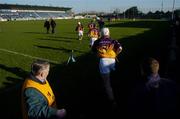 29 January 2006; A steward watches on as the Wexford team makes their onto the pitch. Walsh Cup, Dublin v Wexford, Parnell Park, Dublin. Picture credit: Brian Lawless / SPORTSFILE